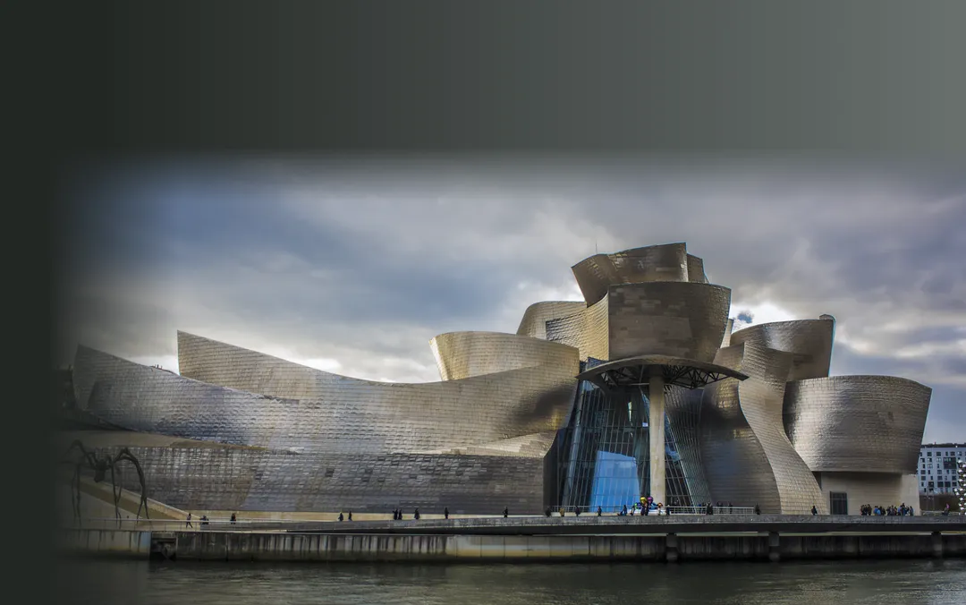The greenfield development opening at rest: the Guggenheim Museum Bilbao seen from the estuary